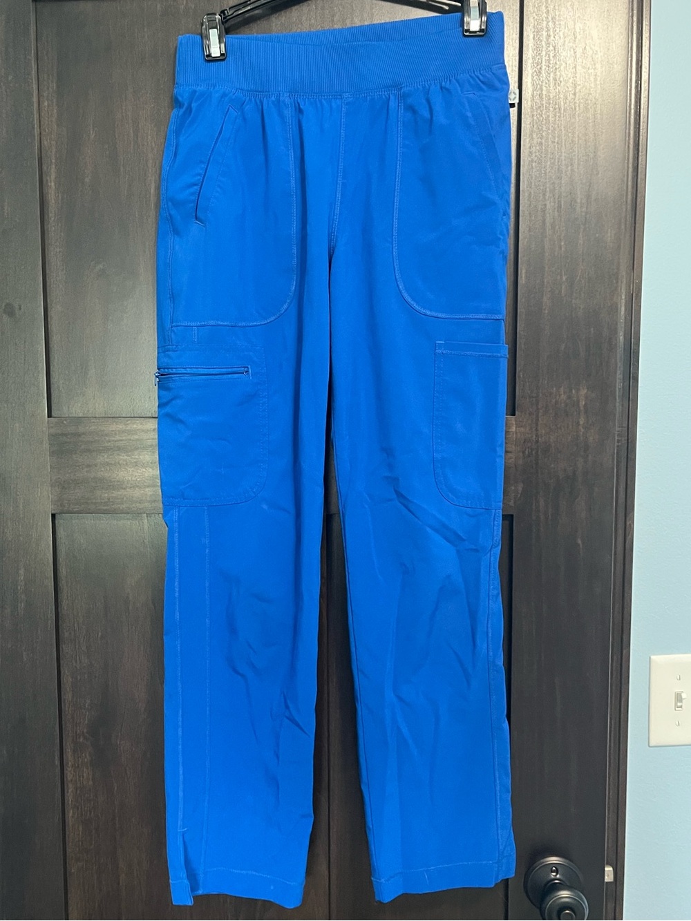 Woman’s royal blue scrub pant